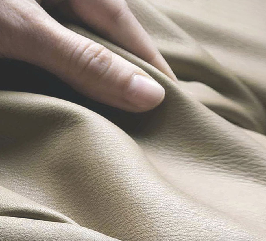 Hand pressing soft touch silicone leather material
